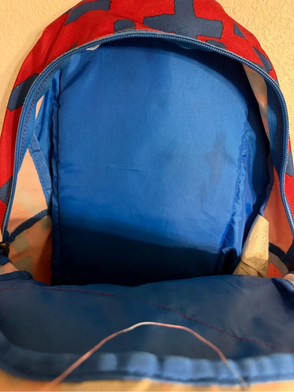 Volcom Red Backpack with Blue Geometric Print